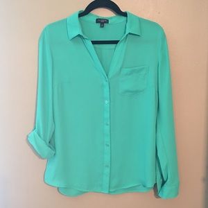 Limited blouse with roll tab sleeves Size M